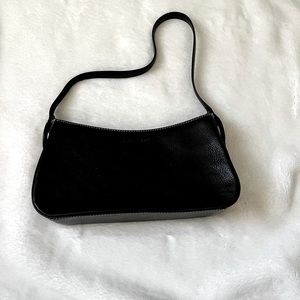 This is a black Cole Haan bag.